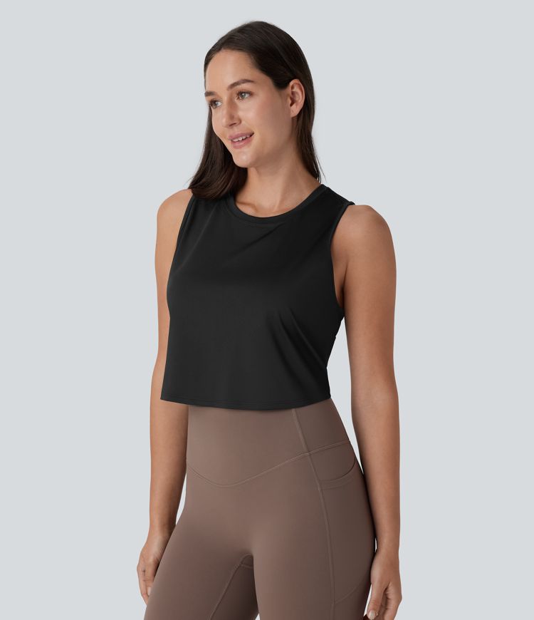 kurzes yoga-tanktop mit cut-out-crossover-saum