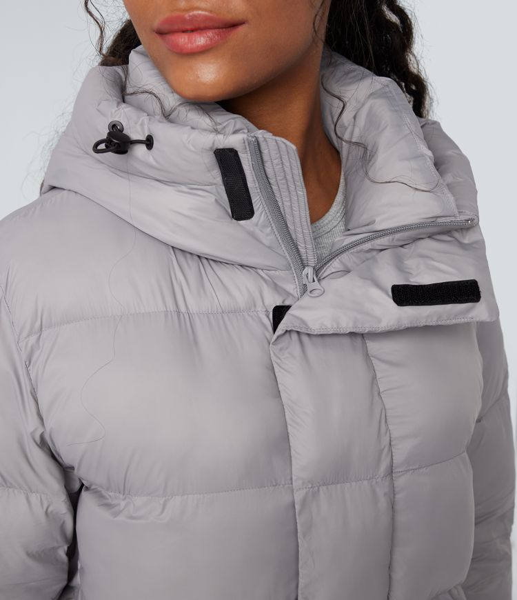 lange lässige steppjacke mit kapuze reißverschluss und taschen