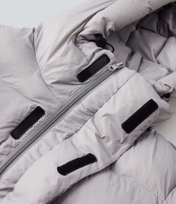 lange lässige steppjacke mit kapuze reißverschluss und taschen