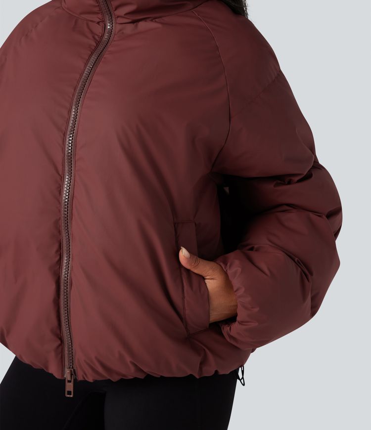 oversize-pufferjacke mit hohem kragen kordelzug am saum und taschen